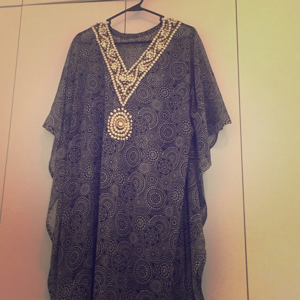 Long Beach tunic with embellishments. One size.